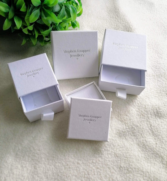 Stephen Knapper Jewellery uses sustainable and eco-friendly packaging. FSC certified recycled cardboard jewellery boxes.